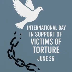A symbolic illustration of a white dove breaking free from black chains, representing peace and freedom, alongside the text “International Day in Support of Victims of Torture – June 26” on a muted blue background.